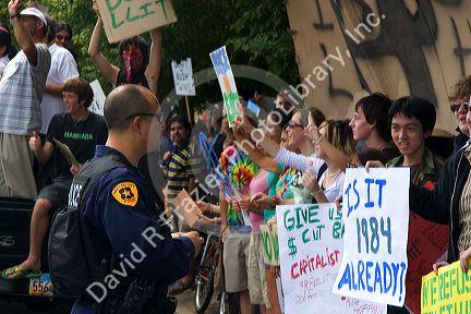 Police offficer watching over anti-war protesters in Salt Lake City, Utah. 8/22/2005