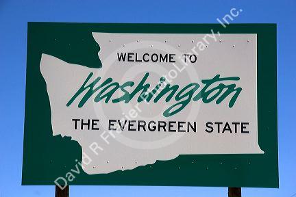 A sign welcoming you to Washington state.
