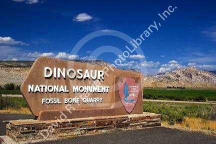 The sign at the entrance to the Dinosaur National Monument and fossil bone quarry at Vernal, Utah.