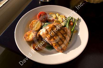 A dinner of salmon at The Cliff House Restaurant on the San Francisco Coast, California.