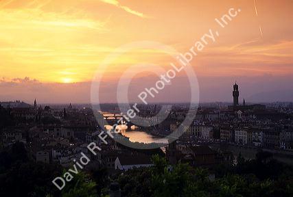 The Arno River and Florence, Italy at sunset.