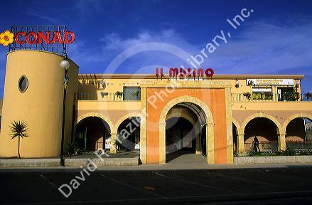 The exterior of a super market in Sardinia, Italy.