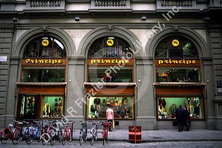 People window shop at a department store in Florence, Italy.