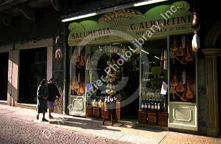 Nuns walking by a market in Italy.