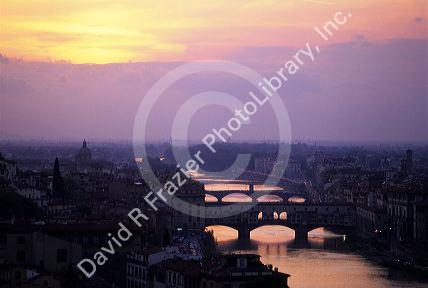 The Arno River and Florence, Italy at sunset.