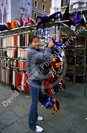 A female Thai street vendor in Venice, Italy.