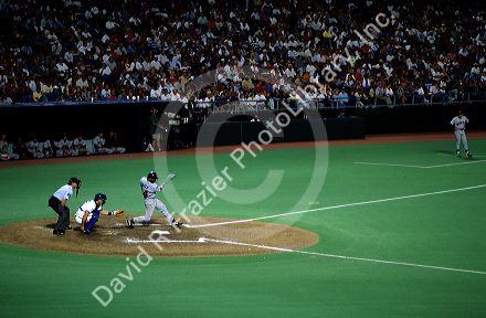 A professional baseball player up to bat at the Kansas City Royals baseball stadium.