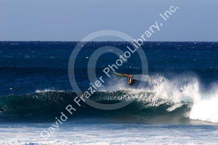 Windsurfing in the pacific ocean off the island of Maui, Hawaii.