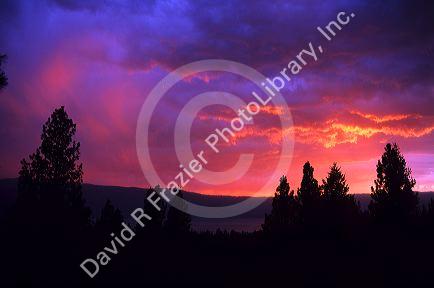 Mountain thunderstorm clouds at sunset over Cascade Lake, Idaho.