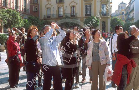 A japanese tourist group in Seville, Spain.