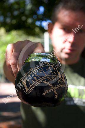 Street vendor selling carved gourds used to drink mate at Plaza Derrego in Buenos Aires, Argentina.