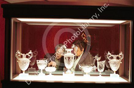 Visitors looking at crystal in the Prado art museum in Madrid, Spain.