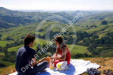 Couple having a picnic along california highway 22 near San Louis Obispo.