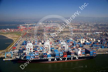 Container ships and cranes at the Port of Oakland, in the bay area of California.