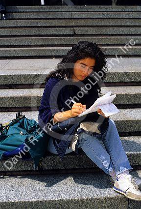 University student writing a letter in Italy.