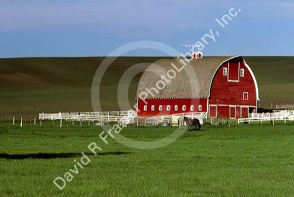 Red barn on a farm in Northern Idaho near Moscow.