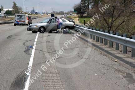 Automoblie accident scene with skid marks on the interstate near Jerome, Idaho.