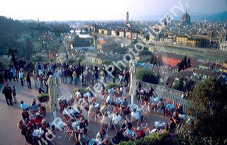 Outdoor cafe at Piazza Michelangelo overlooking Florence, Italy and the Arno River.