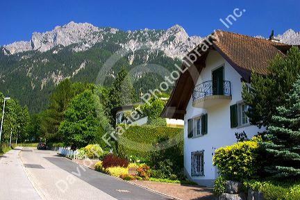 Housing in Lichtenstein with the Swiss Alps in the background.