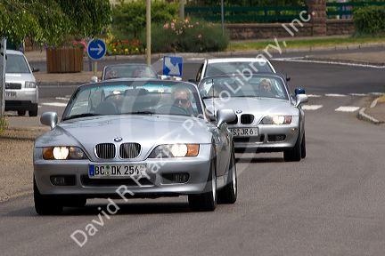 BMW cars on the road near Ribeauville, France.
