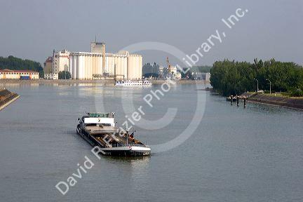 Barge on the Rhine River between France and Germany near Frieberg, Germany.