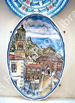 Ceramic  plate on display depicting Amalfi, Italy cathederal.