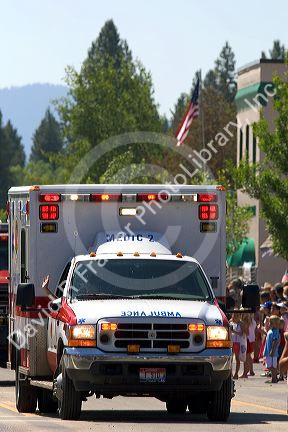 Ambulance driving in a small town Fourth of July parade in Cascade, Idaho.