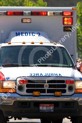 Ambulance driving in a small town Fourth of July parade in Cascade, Idaho.