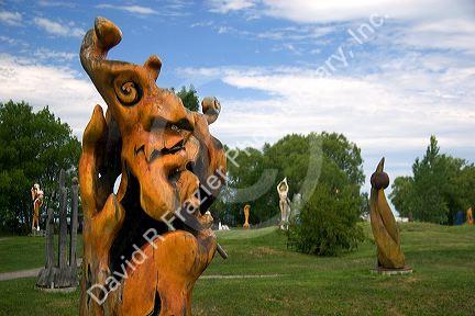 Wood sculptures at Parc des Trois Berets in the village of St.-Jean-Port-Joli along the St. Lawrence River, Quebec, Canada.
