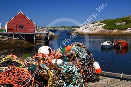 Lobster pots, buoys, and ropes on the dock at Peggy's Cove, Nova Scotia, Canada.