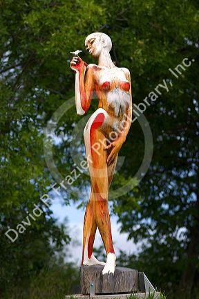 Wood sculptures at Parc des Trois Berets in the village of St.-Jean-Port-Joli along the St. Lawrence River, Quebec, Canada.