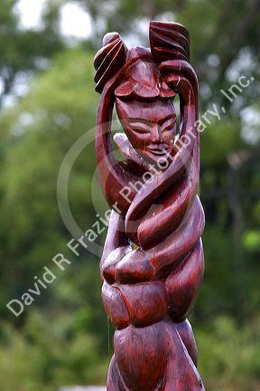 Wood sculptures at Parc des Trois Berets in the village of St.-Jean-Port-Joli along the St. Lawrence River, Quebec, Canada.