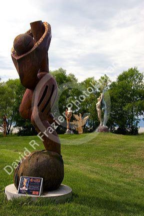 Wood sculptures at Parc des Trois Berets in the village of St.-Jean-Port-Joli along the St. Lawrence River, Quebec, Canada.