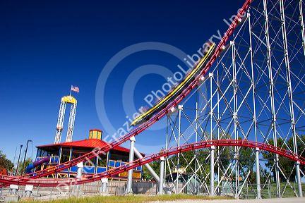 The Mamba roller coaster in motion at Worlds of Fun in Kansas City, Missouri.