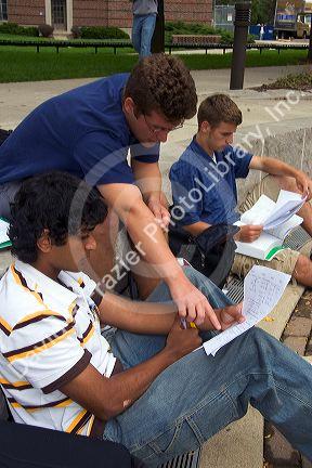 Students study with a tutor on the campus of Purdue University at West Layfayette, Indiana.