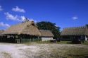 A seminole Miccosukee Indian village with chopekcheke traditional thatched roof dwellings in Florida.