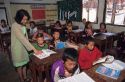 School children and teacher in Thailand with Hmong tribe pupils.