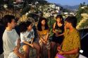 Mexican teens talking in a group at Acapulco, Mexico.
