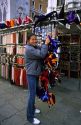 A female Thai street vendor in Venice, Italy.