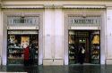 People window shop at a Profumeria in Rome, Italy.
