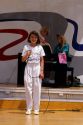 A young female singer on stage.
