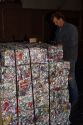 Aluminum cans crushed into blocks for recycling.