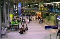 Travelers at the airport terminal in Cologne, Germany.