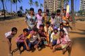 Indians at Mumbai Bombay display their Holi Festival colors splashed on their faces in India.
