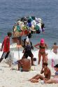 Vendor selling beach apparel at Ipanema Beach in Rio de Janeiro, Brazil.