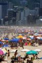 Crowded beach scene at the Copacabana Beach in Rio de Janeiro, Brazil.