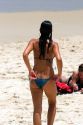 Woman in a bikini at the Copacabana Beach in Rio de Janeiro, Brazil.