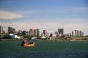 Fishing boat at Puerto Faro, Mar del Plata, Argentina heads out to sea.