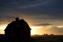 Barn near Burley, Idaho at sunset.