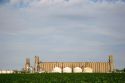Soy bean field and grain elevators along the Mississippi River in Helena, Arkansas.